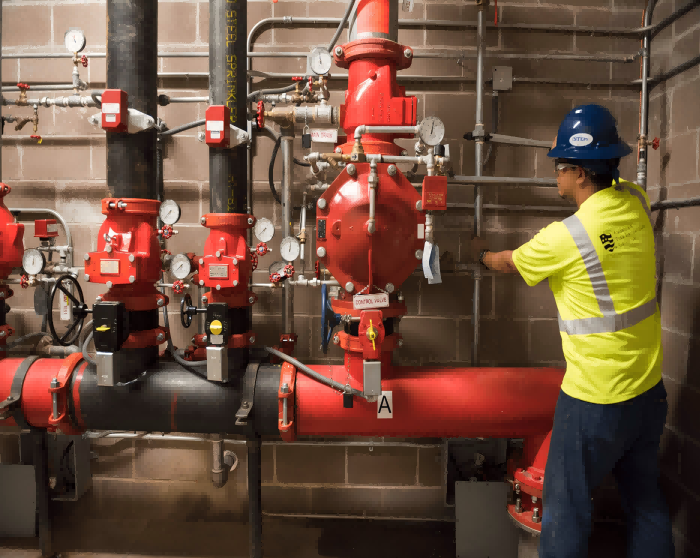 Sprinkler-Tech-Working-on-Sprinkler-System1 Sprinkler-Tech-Working-on-Sprinkler-System1